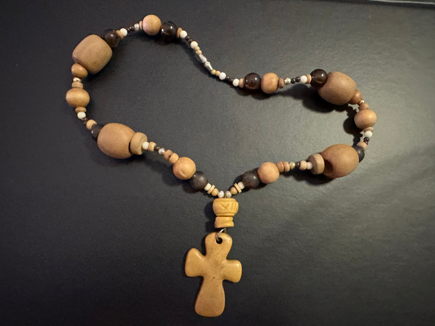 Rustic handcrafted Necklace with beaded wood and plastic with a cross